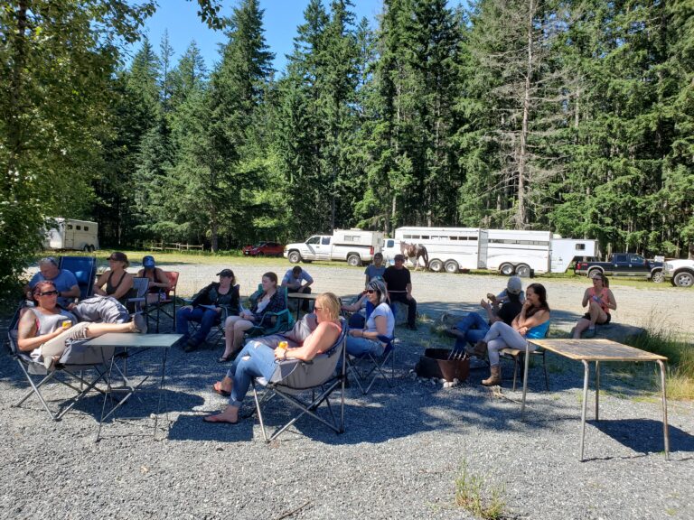 Central Vancouver Island Chapter members at picnic tables at Spruston
