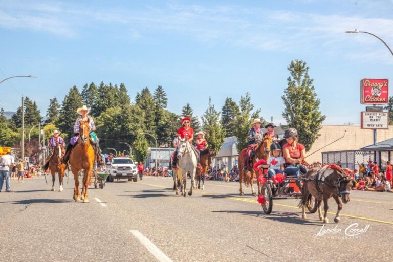 Alberni Valley Chapter riders and a horse-drawn wagon in the 2018 Canada Day parade