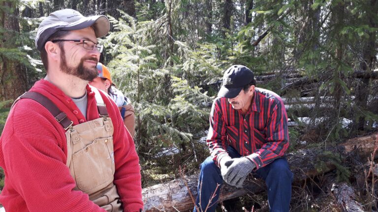 Chapter members in a forest at a Prince George Omineca Chapter work bee
