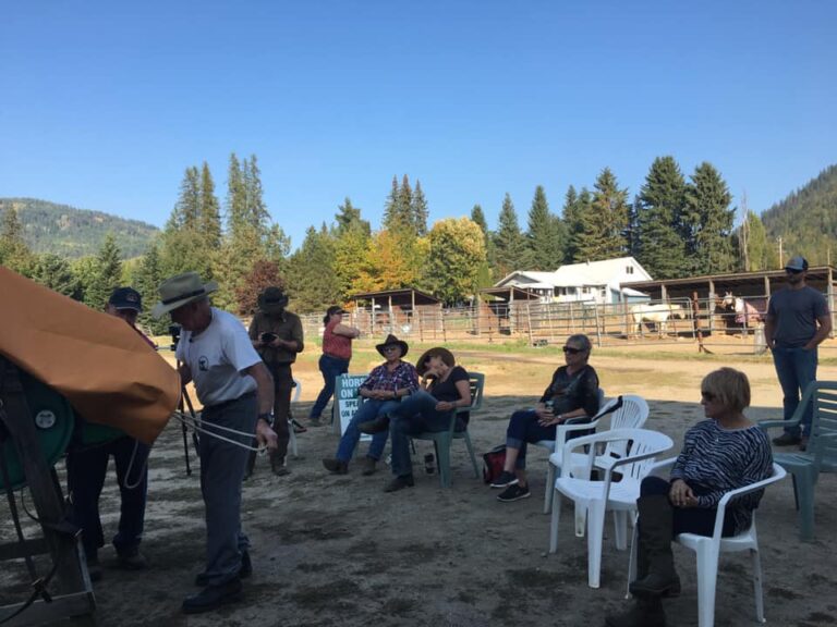 West Kootenay Chapter members seated outdoors at a clinic
