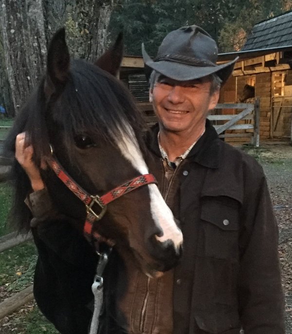 Ken Matthews, BCHBC Treasurer, with a paint horse