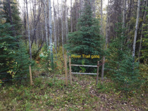 Aerial view of the trail gate into the forest at Coalmine Camp