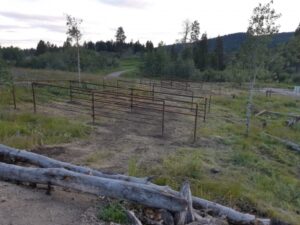 Corrals and log barrier at a campsite in the Kane Valley