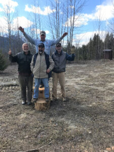 Volunteers celebrating at the completed Moose River staging area