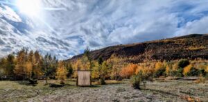 Autumn colours across the hills around Fishtrap Recreation Campsite
